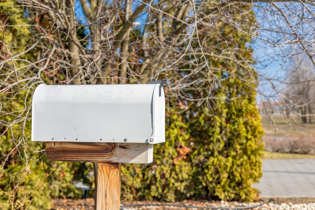 Custom direct mail postcard being delivered to a homeowner after visiting a local business website 
